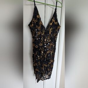 Elegant Black and Gold Sequin Dress